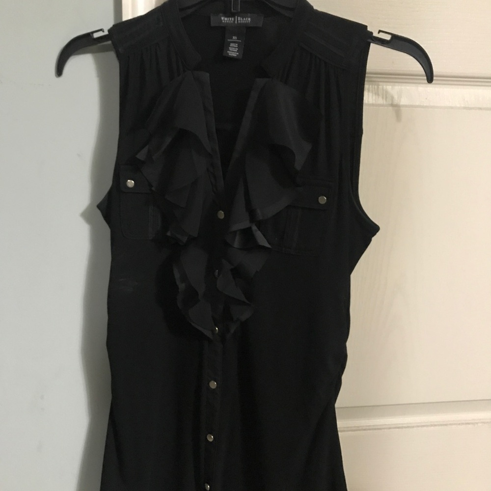 Sleeveless button down top
